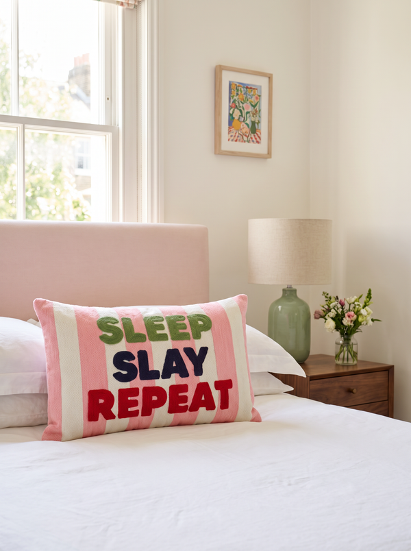 Sleep Slay Repeat needlepoint cushion styled at home