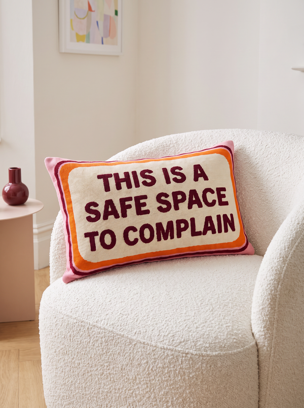 This Is a Safe Space To Complain needlepoint cushion styled at home