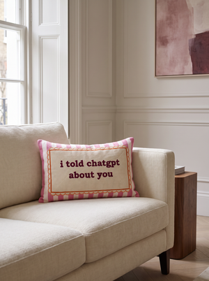 I Told ChatGPT About You needlepoint cushion styled at home