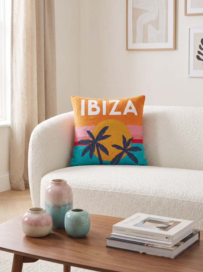 Ibiza needlepoint cushion at home