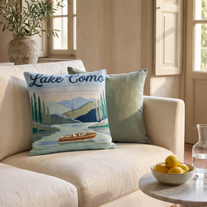 Lake Como needlepoint cushion styled in a bright living room
