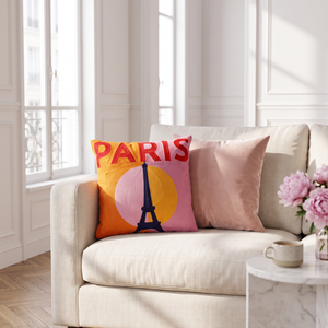 Paris Eiffel Tower needlepoint cushion styled in a bright Parisian apartment